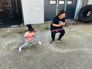 Mom and daughter working out